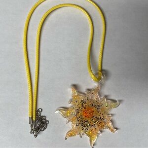 Handmade starburst resin necklace